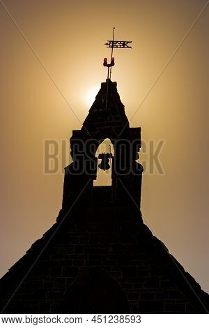 Silhouette Of Old Church Bell Tower At Sunset In Bulla Victoria