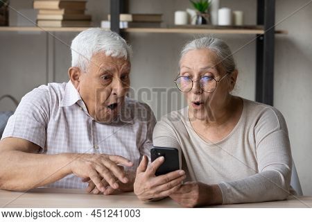 Grandparents Open Mouth Gawp At Cellphone Screen, Read Unbelievable News