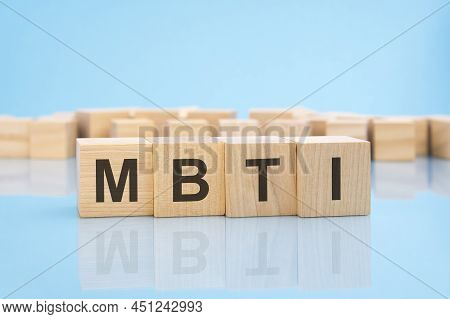 Wooden Blocks With The Word Mbti, Blue Background