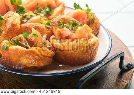Yorkshire Pudding. Traditional English Yorkshire Pudding With Salmon And Radish Microgreens Side Dis