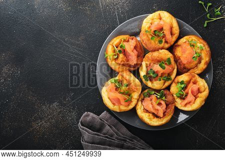 Yorkshire Pudding. Traditional English Yorkshire Pudding With Salmon And Radish Microgreens Side Dis