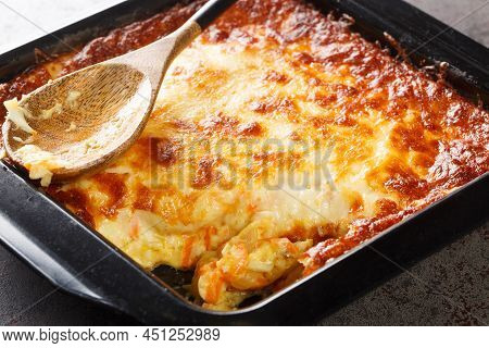 Portuguese Casserole Bacalhau Espiritual Or Spiritual Cod Closeup In The Baking Dish. Horizontal