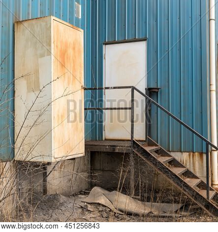 Metal Steps To A Door On A Warehouse In Braddock, Pennsylvania, Usa On A Sunny Day