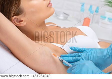 Aesthetic Cosmetologist Makes Lipolytic Injections To Burn Fat On The Arm And Body Of A Woman. Femal