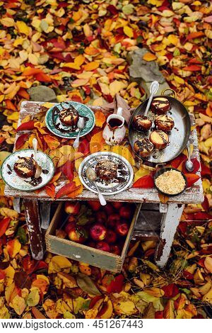 Stuffed Apple Cheesecake On The Table In The Autumn Garden . Selective Focus