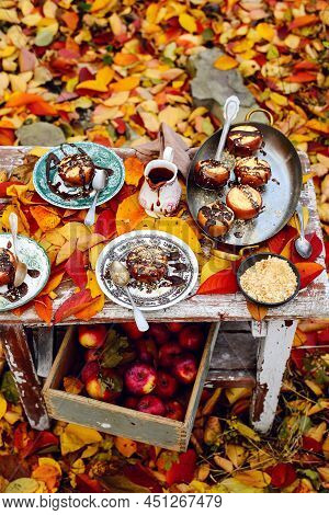Stuffed Apple Cheesecake On The Table In The Autumn Garden . Selective Focus