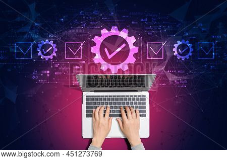 Quality Control Approval With Person Using A Laptop Computer