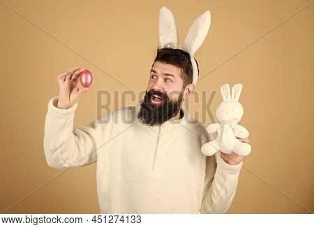 Easter Activities Concept. Weirdo Concept. Celebrate Easter. Guy Bearded Hipster Weird Bunny With Lo