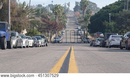 American Residential District, Suburban Street. Cars And Palm Trees In City Near Los Angeles. Ocean 