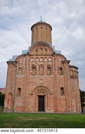 Medieval Brick Church In The Ukrainian City Of Chernihiv. Medieval Architecture. Church On A Cloudy 