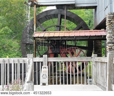 Water Wheel At Saunooke Mill, A Working Stone Ground Mill Beside The Oconaluftee River In Cherokee, 