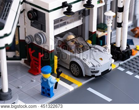 Tambov, Russian Federation - January 03, 2022 Lego Porsche 911 Leaving A Vehicle Workshop. Lego Mech