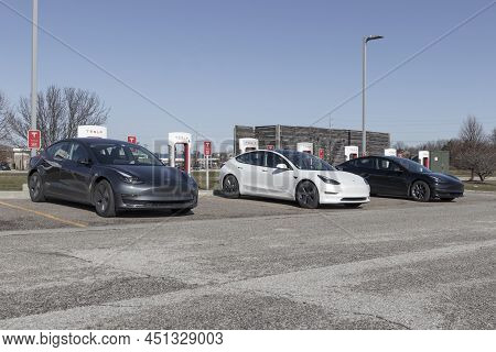 Tesla Ev Electric Vehicles Charging. Tesla Products Include Electric Cars, Battery Energy Storage An