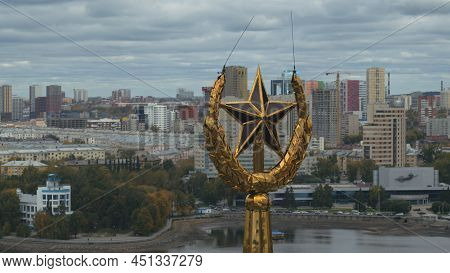 Top View Of Star On Spire On Background Of City. Stock Footage. Beautiful Spire With Star Towers Ove