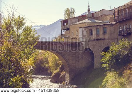 Akhty Village, Dagestan, Russia. View Of The Stone Arched Bridge Usta Idrisan Muig And The Akhtychay