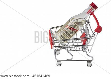 Close Up View Of Bottle Vodka In Trolley Isolated On White Background. Unhealthy Food Concept. Swede