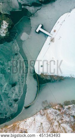 Patterns Of Water Frozen In Winter Seen On A Morning From An Aerial View