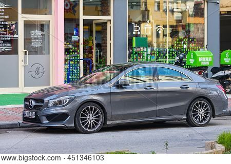 Antalya; Turkey - March 03 2022:    Silver Mercedes-benz Cla-class  Is Parking  On The Street On A  