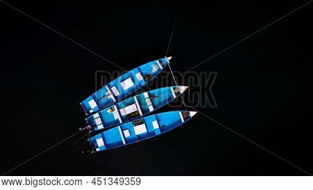 Aerial View Traditional Fisher Boat Tied Up Near Shore Before Sailing Into Sea .