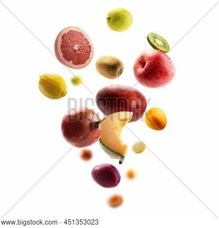 Fresh Fruits Levitate On A White Background