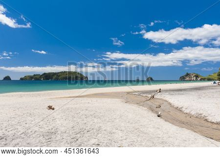 Photo of a beautiful white sand Hahei beach at Cathedral Cove Marine Reserve, Coromandel Peninsula, New Zealand. 