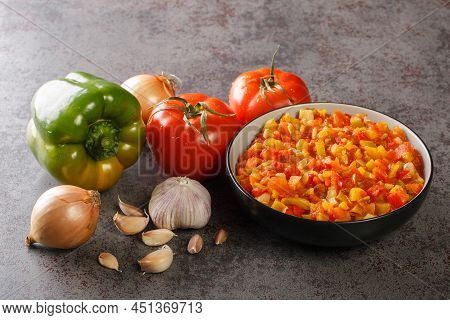 Homemade Fresh Sofrito Sauce From Summer Vegetables Close-up In A Bowl On The Table. Horizontal