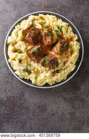 Traditional Greek Veal Sofrito Straight From The Island Of Corfu Served With Mashed Potatoes Closeup