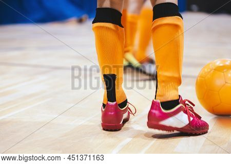 Indoor Futsal Soccer Players Playing Futsal Match. Indoor Soccer Sports Hall. Futsal Players Kicking