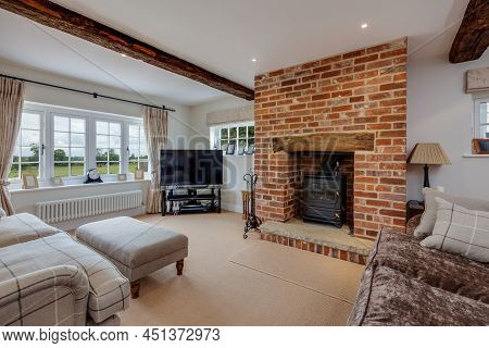 Clavering, Essex - July 13 2016: Stylish Modern Furnished Sitting Room In Traditional Style With Bri