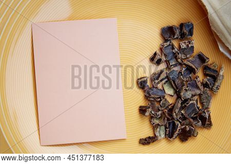Carob - Coffee Alternative - Organic Product On The Plate. Natural Plant-based Caffeine Antioxidants