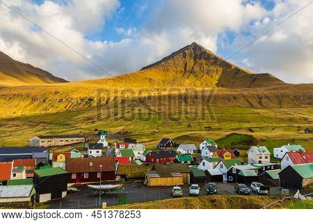 Gjogv, Faroe Islands, Denmark - 05 May 2018: Small Village Gjogv Situated On The Slope Of The Mounta