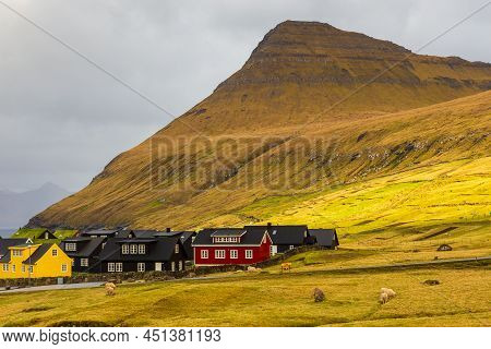 Gjogv, Faroe Islands, Denmark - 05 May 2018: Small Village Gjogv Situated On The Slope Of The Mounta