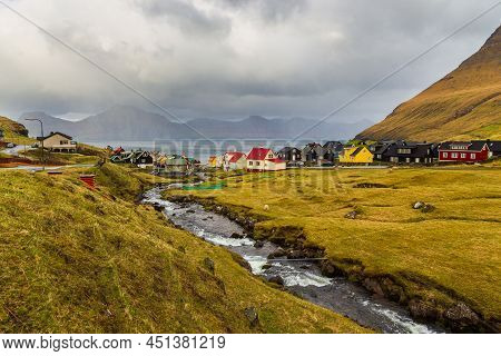 Gjogv, Faroe Islands, Denmark - 05 May 2018: Small Village Gjogv Situated On The Slope Of The Mounta