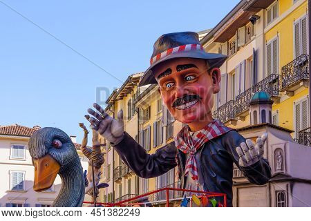 Crema, Italy - February 27, 2022: A Carnival Parade Figure On Display In The Cathedral (duomo) Squar