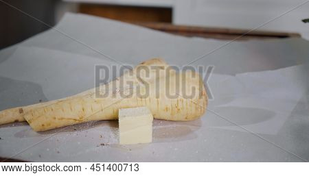 Seasoning The Roots Of Vegetables Like Parsley Or Parsnip Preparing For Cooking. Home Cooking Health