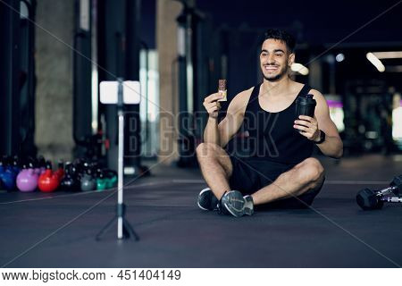 Handsome Arab Male Athlete Advertsing Fitness Snacks In His Video Blog