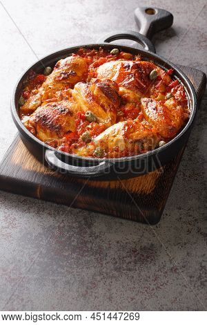 Mediterranean Chicken Baked With Tomatoes, Peppers, Onions And Garlic Close-up In A Frying Pan On Th