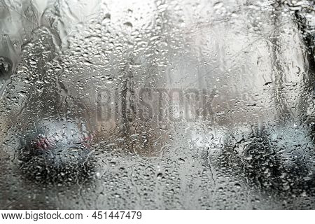 Close The Misted Glass With Water Drops Flowing Down. Dripping Condensation, Drops Of Water. Backgro