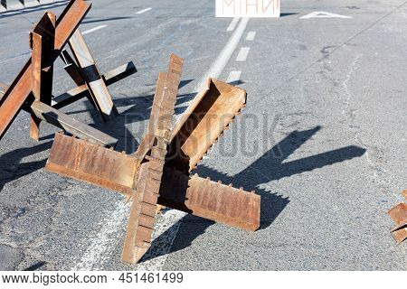 War Of Russia Against Ukraine. Anti-tank Metal Structures On The Streets Of Kyiv. Antitank Hedgehogs