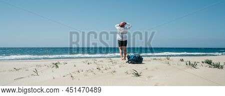 Backpacker Female On The Patara Sand Dunes Beach Enjoying The Windy Mediterranean Sea During Lycian 