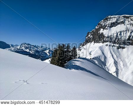 Ski Tour In Switzerland. Mountaineering With Ski On The Mountain Silberen In The Canton Of Glarus Ur