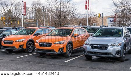 Monroeville, Pennsylvania, Usa March 20, 2022 Three New Subaru Cars Together At A Dealership On A Su