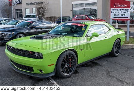 Monroeville, Pennsylvania, Usa March 20, 2022 A 2019 Lime Green Dodge Charger With A 392 Hemi Motor 