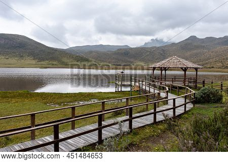 Cotopaxi National Park. Observation Deck And Wooden Walkway At Lake Limpiopungo On An Overcast Rainy