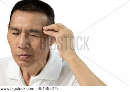 Stressed Asian Middle Aged Man Has A Bad Headache,chronic Headache From Stress,an Attack Of Migraine