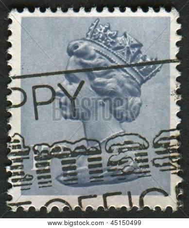 UK-CIRCA 1983:A stempel trykt i UK viser billede af Elizabeth II er den forfatningsmæssige monark af 16 