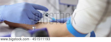 Nurse Giving Intravenous Injection Into Patient Ulnar Vein At Clinic Closeup. Parenteral Drug Admini