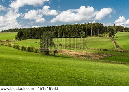 Nature Landscapes With Green Hills At Woods During Summer At The East Belgian Countryside Around Bul