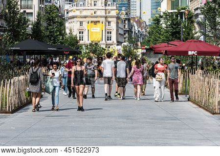 Brussels Old Town- Belgium - 07 05 2019, People Walking Down The Pedestrain Zone At The Anspach Aven