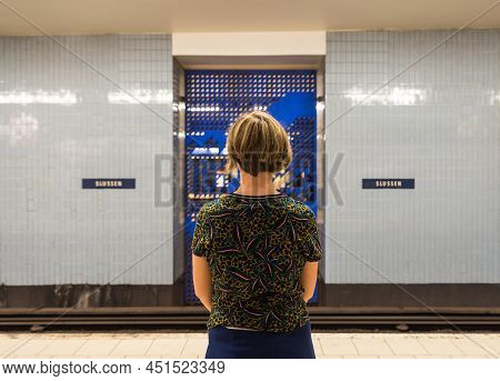 Stockholm, Sweden - 07 24 2019- Woman Waiting At The Slussen Underground Train Metro Station